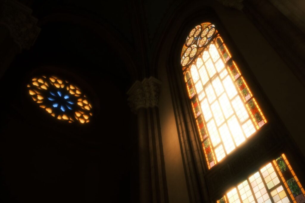 Wnętrze gotyckiej katedry z witrażami i rozetą